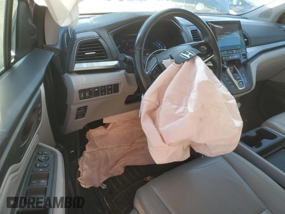 2019 Honda Odyssey Touring with VIN 5FNRL6H85KB022527, listed as a Copart auction lot 43851485 with 104,332 mi miles and Salvage Title. Bid and sale history available at carsss.com. Image 8.