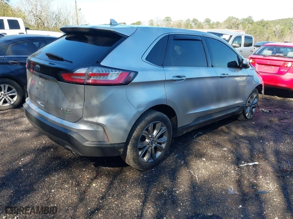 2019 Ford Edge Titanium with VIN 2FMPK3K99KBC02998, listed as a IAAI auction lot 41764680 with 150,338 mi miles. Bid and sale history available at carsss.com. Image 4.