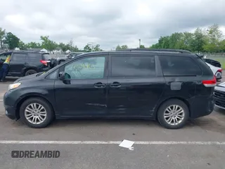 2012 Toyota Sienna XLE AAS with VIN 5TDYK3DC3CS255214, listed as a IAAI auction lot 42390803 with 113,425 mi miles and . Bid and sale history available at DreamBid. Image 14.