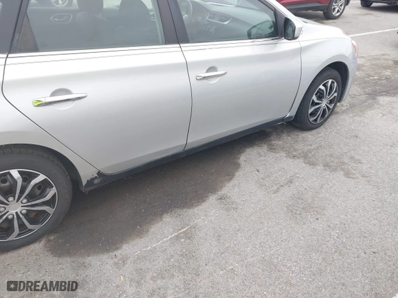 2015 Nissan Sentra S with VIN 3N1AB7AP0FY231596, listed as a IAAI auction lot 42086308 with 220,451 mi miles. Bid and sale history available at carsss.com. Image 12.
