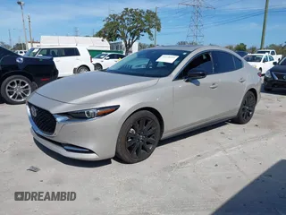2023 Mazda 3 Premium Plus with VIN 3MZBPBEY3PM385377, listed as a IAAI auction lot 41478593 with 10,924 mi miles and . Bid and sale history available at DreamBid. Image 2.