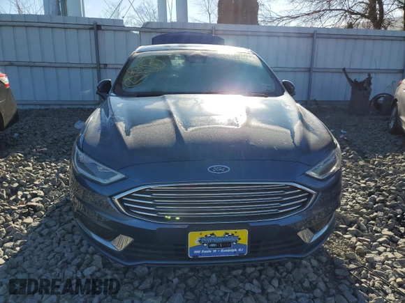 2018 Ford Fusion Hybrid SE with VIN 3FA6P0LU0JR152209, listed as a Copart auction lot 68148722 with 66,729 mi miles. Bid and sale history available at carsss.com. Image 5.