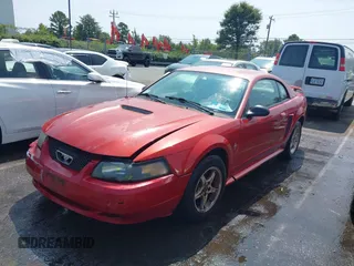 2002 Ford Mustang Standard z VIN 1FAFP40422F114992, wystawiony jako IAAI lot #40289505 z przebiegiem Nie podano mil oraz . Historia ofert i sprzedaży dostępna na DreamBid. Obrazek 2.