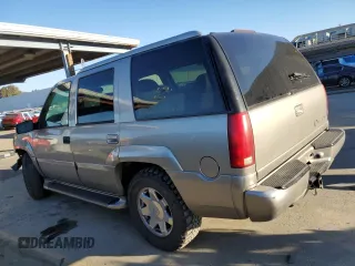 2000 Cadillac Escalade z VIN 1GYEK13R5YR107157, wystawiony jako Copart lot #89024795 z przebiegiem 172 599 mil mil oraz Szkody całkowita. Historia ofert i sprzedaży dostępna na DreamBid. Obrazek 2.
