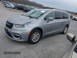 2021 Chrysler Pacifica Touring L with VIN 2C4RC1BG3MR542543, listed as a IAAI auction lot 41657073 with 118,833 mi miles and . Bid and sale history available at DreamBid. Image 18.