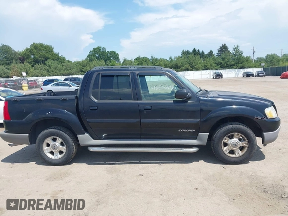 2002 Ford Explorer Sport Trac Value z VIN 1FMZU77E82UB50497, wystawiony jako IAAI lot #42562070 z przebiegiem 188 602 mil mil oraz . Historia ofert i sprzedaży dostępna na DreamBid. Obrazek 13.