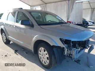 2020 Dodge Journey SE Value with VIN 3C4PDCAB7LT261203, listed as a IAAI auction lot 41963451 with 69,612 mi miles and . Bid and sale history available at carsss.com. Image 1.