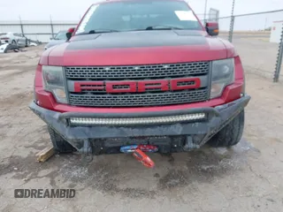 2014 Ford F-150 SVT Raptor with VIN 1FTFW1R61EFC00041, listed as a IAAI auction lot 41609376 with 119,325 mi miles and . Bid and sale history available at carsss.com. Image 6.