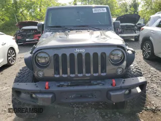 2016 Jeep Wrangler Unlimited Rubicon with VIN 1C4BJWFG4GL252209, listed as a Copart auction lot 58525725 with 46,604 mi miles and Salvage title. Bid and sale history available at DreamBid. Image 5.
