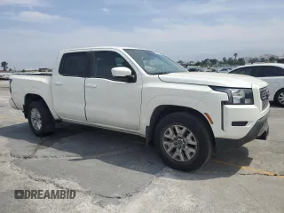 2022 Nissan Frontier SV with VIN 1N6ED1EJ2NN646598, listed as a Copart auction lot 58439325 with 56,882 mi miles and Salvage title. Bid and sale history available at DreamBid. Image 4.