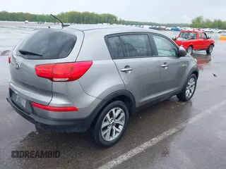 2015 Kia Sportage LX with VIN KNDPB3AC1F7784479, listed as a IAAI auction lot 42124599 with 137,190 mi miles and . Bid and sale history available at carsss.com. Image 4.
