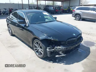2019 BMW 3 Series 330i with VIN WBA5R1C51KFH09402, listed as a IAAI auction lot 41869138 with 59,115 mi miles. Bid and sale history available at carsss.com. Image 1.