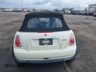 2006 MINI Convertible with VIN WMWRF33566TF65410, listed as a IAAI auction lot 40813052 with 131,109 mi miles and . Bid and sale history available at DreamBid. Image 16.