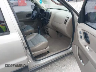 2001 Ford Escape with VIN 1FMUU01B61KE00524, listed as a IAAI auction lot 41486950 with 163,753 mi miles and . Bid and sale history available at DreamBid. Image 5.
