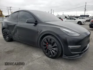 2022 Tesla Model Y Performance with VIN 7SAYGDEF7NF318647, listed as a Copart auction lot 53822465 with 38,724 mi miles and Salvage title. Bid and sale history available at DreamBid. Image 4.