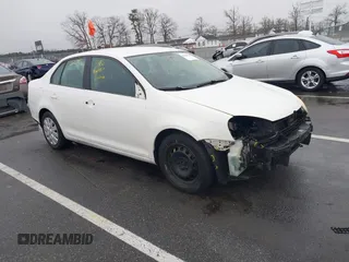 2009 Volkswagen Jetta S z VIN 3VWJZ71K49M129501, wystawiony jako IAAI lot #41461767 z przebiegiem 250 552 mil mil oraz . Historia ofert i sprzedaży dostępna na DreamBid. Obrazek 1.