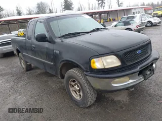 1997 Ford F-150 XL z VIN 1FTDX1869VKB10293, wystawiony jako IAAI lot #41697978 z przebiegiem 161 898 mil mil oraz . Historia ofert i sprzedaży dostępna na DreamBid. Obrazek 1.