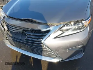 2016 Lexus ES 300h z VIN JTHBW1GG6G2108510, wystawiony jako IAAI lot #41959175 z przebiegiem 142 882 mil mil oraz . Historia ofert i sprzedaży dostępna na DreamBid. Obrazek 17.