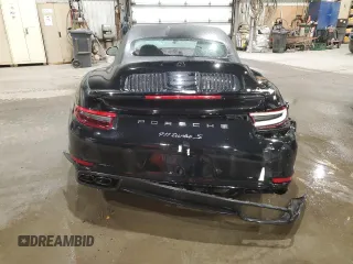 2019 Porsche 911 Turbo S with VIN WP0CD2A9XKS144611, listed as a Copart auction lot 77636924 with 62,657 mi miles and Salvage Title. Bid and sale history available at carsss.com. Image 6.