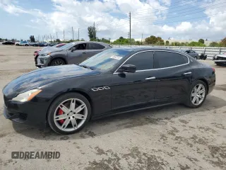 2016 Maserati Quattroporte S with VIN ZAM56RPA8G1173093, listed as a Copart auction lot 48932213 with 105,098 mi miles. Bid and sale history available at carsss.com. Image 1.