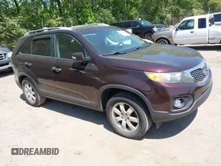 2012 Kia Sorento LX with VIN 5XYKT4A27CG195861, listed as a IAAI auction lot 42241593 with 175,282 mi miles and . Bid and sale history available at carsss.com. Image 1.