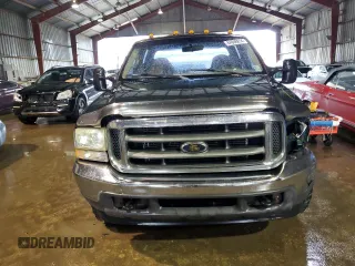 2002 Ford F-250 XL with VIN 1FTNW20F52EA52699, listed as a Copart auction lot 84088814 with 299,869 mi miles and Salvage Title. Bid and sale history available at DreamBid. Image 5.