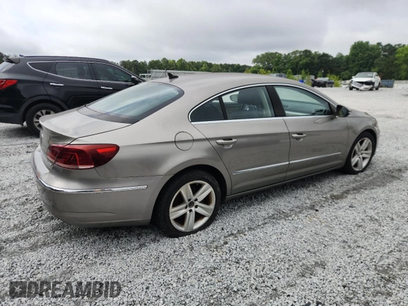 2014 Volkswagen CC Sport с VIN WVWBN7AN2EE509613, выставлен на аукционе Copart как лот 61609035 с пробегом 118 364 миль миль и Чистый • Clean title. История ставок и продаж доступна на DreamBid. Изображение 3.