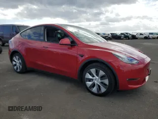2021 Tesla Model Y Standard Range z VIN 5YJYGDED7MF111377, wystawiony jako Copart lot #45772075 z przebiegiem 34 331 mil mil oraz Szkoda całkowita • Salvage title. Historia ofert i sprzedaży dostępna na DreamBid. Obrazek 4.