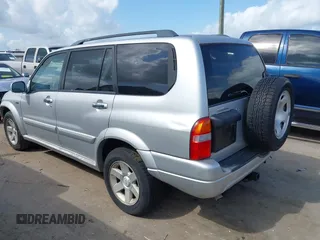 2003 Suzuki XL7 Touring z VIN JS3TY92V934101118, wystawiony jako IAAI lot #42425129 z przebiegiem 175 455 mil mil oraz . Historia ofert i sprzedaży dostępna na DreamBid. Obrazek 3.
