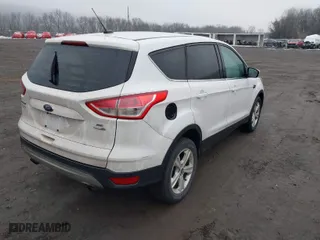 2015 Ford Escape SE with VIN 1FMCU9GX7FUB50189, listed as a IAAI auction lot 41451731 with 234,811 mi miles. Bid and sale history available at carsss.com. Image 4.