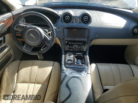 2014 Jaguar XJ Portfolio z VIN SAJWA2GZ0E8V59422, wystawiony jako Copart lot #74213414 z przebiegiem 96 314 mil mil oraz Nie do naprawy • Non repairable. Historia ofert i sprzedaży dostępna na DreamBid. Obrazek 8.