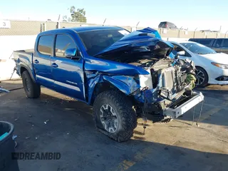 2016 Toyota Tacoma SR5 z VIN 3TMAZ5CN7GM023216, wystawiony jako IAAI lot #41348353 z przebiegiem Nie podano mil oraz . Historia ofert i sprzedaży dostępna na DreamBid. Obrazek 1.