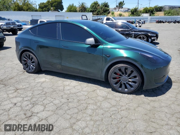 2022 Tesla Model Y Performance z VIN 7SAYGDEF2NF573979, wystawiony jako Copart lot #57778265 z przebiegiem 49 232 mil mil oraz Szkoda całkowita • Salvage title. Historia ofert i sprzedaży dostępna na DreamBid. Obrazek 4.