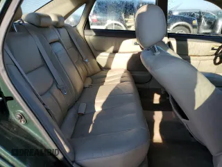2001 Toyota Avalon XL z VIN 4T1BF28B81U162506, wystawiony jako Copart lot #52031805 z przebiegiem 212 437 mil mil oraz Szkody całkowita. Historia ofert i sprzedaży dostępna na DreamBid. Obrazek 10.