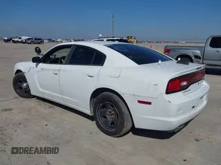 2012 Dodge Charger Police with VIN 2C3CDXAT6CH305817, listed as a IAAI auction lot 41608673 with 173,761 mi miles. Bid and sale history available at carsss.com. Image 3.