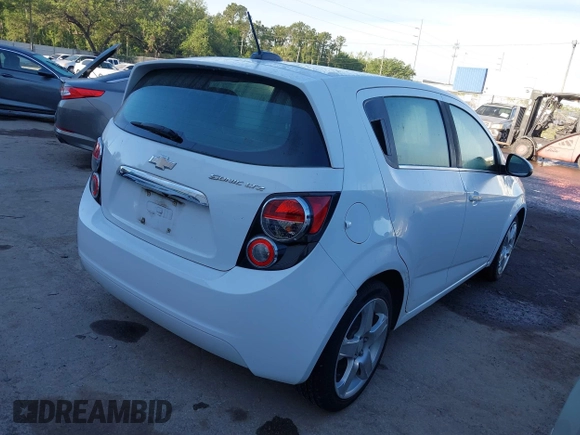 2016 Chevrolet Sonic LTZ z VIN 1G1JE6SB0G4161094, wystawiony jako IAAI lot #41890781 z przebiegiem 121 282 mil mil oraz . Historia ofert i sprzedaży dostępna na DreamBid. Obrazek 4.
