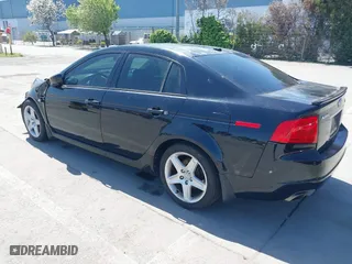 2005 Acura TL with VIN 19UUA66235A024256, listed as a IAAI auction lot 42004726 with 198,679 mi miles. Bid and sale history available at carsss.com. Image 3.