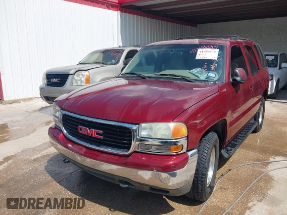 2002 GMC Yukon SLE with VIN 1GKEC13V12R116854, listed as a IAAI auction lot 41799335 with 270,063 mi miles. Bid and sale history available at carsss.com. Image 6.
