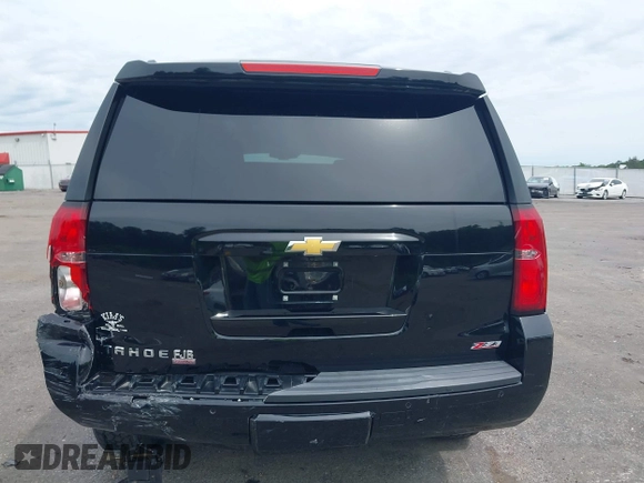 2017 Chevrolet Tahoe LT z VIN 1GNSKBKC8HR311969, wystawiony jako IAAI lot #42126414 z przebiegiem 160 994 mil mil oraz . Historia ofert i sprzedaży dostępna na DreamBid. Obrazek 16.