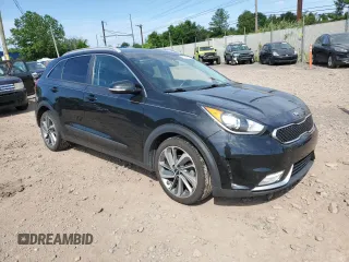 2017 Kia Niro Touring with VIN KNDCE3LC4H5072016, listed as a Copart auction lot 58342094 with 83,163 mi miles and Salvage Title. Bid and sale history available at carsss.com. Image 4.