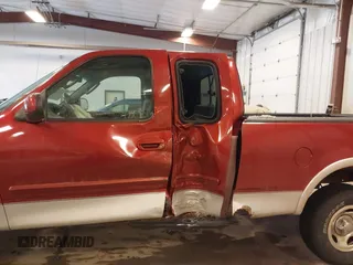 2003 Ford F-150 XL with VIN 1FTRX18L33NB82694, listed as a IAAI auction lot 41612431 with 179,664 mi miles. Bid and sale history available at carsss.com. Image 6.