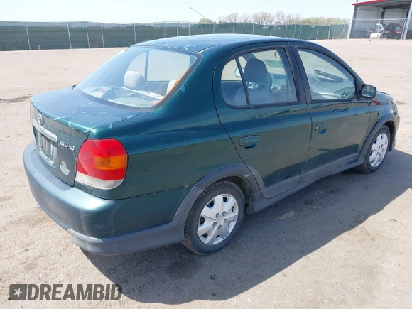 2003 Toyota ECHO with VIN JTDBT123135040950, listed as a IAAI auction lot 42136631 with 278,956 mi miles. Bid and sale history available at carsss.com. Image 4.