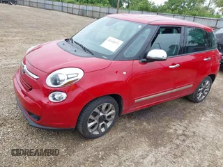 2014 FIAT 500L Lounge z VIN ZFBCFACH5EZ009320, wystawiony jako IAAI lot #42340573 z przebiegiem 147 946 mil mil oraz . Historia ofert i sprzedaży dostępna na DreamBid. Obrazek 2.