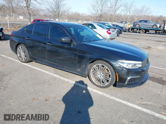 2018 BMW 5 Series M550i xDrive with VIN WBAJB9C55JB049529, listed as a IAAI auction lot 41241917 with 116,265 mi miles and . Bid and sale history available at carsss.com. Image 1.