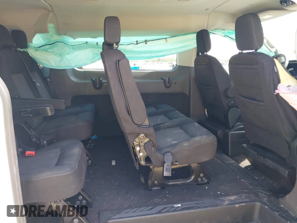 2020 Ford Transit Passenger XL with VIN 1FBAX2Y80LKA42137, listed as a IAAI auction lot 42802902 with 59,540 mi miles and . Bid and sale history available at DreamBid. Image 8.
