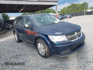 2014 Dodge Journey American Value with VIN 3C4PDCABXET133198, listed as a IAAI auction lot 42609389 with 121,888 mi miles and . Bid and sale history available at DreamBid. Image 1.