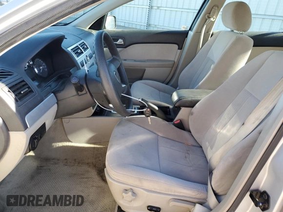 2006 Mercury Milan with VIN 3MEFM07176R612667, listed as a Copart auction lot 77498664 with 145,760 mi miles and Salvage title. Bid and sale history available at DreamBid. Image 7.