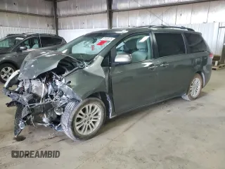 2014 Toyota Sienna XLE z VIN 5TDYK3DC2ES480517, wystawiony jako Copart lot #57408675 z przebiegiem Nie podano mil oraz Szkoda całkowita • Salvage title. Historia ofert i sprzedaży dostępna na DreamBid. Obrazek 1.