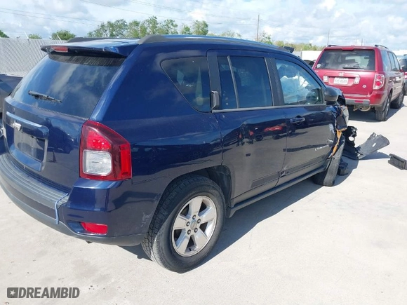 2014 Jeep Compass Sport with VIN 1C4NJCBA8ED594055, listed as a IAAI auction lot 40124452 with 106,067 mi miles. Bid and sale history available at carsss.com. Image 4.