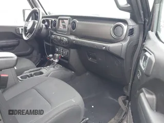 2022 Jeep Wrangler Unlimited Willys Sport with VIN 1C4HJXDN3NW132771, listed as a IAAI auction lot 41052274 with 33,302 mi miles and . Bid and sale history available at DreamBid. Image 5.